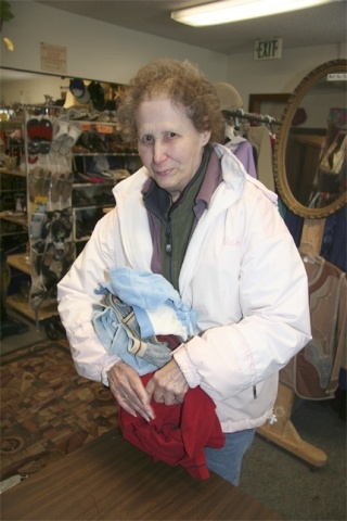 Regular volunteer Merle Judd of Snoqualmie sorts children’s clothing at the Mount Si Senior Center Thrift Store. Residents can support the senior center this year by shopping at the thrift store
