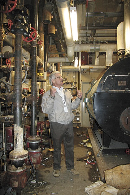 Inspecting the gutted boiler room at Mount Si High School