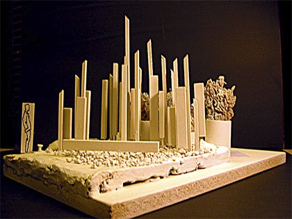 A model of the new downtown gateway sculpture planned in North Bend shows vertical metal rods and cedar slabs. The shape will direct views up to Mount Si.