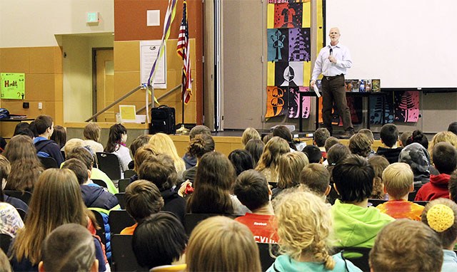Ben Mikaelsen speaks with sixth graders at Twin Falls Middle School about his book “Touching Spirit Bear” February 3.