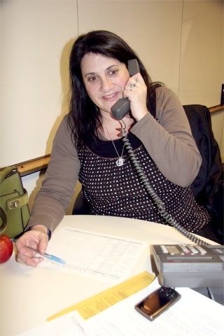 Valley teacher Dana Nohavec volunteers on a phone bank Thursday evening