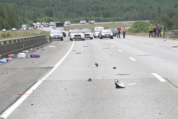 Debris from a fatal Tuesday morning accident littered the westbound lanes of Interstate 90 at exit 34 near North Bend. A Tacoma couple died and three children were hospitalized following the accident