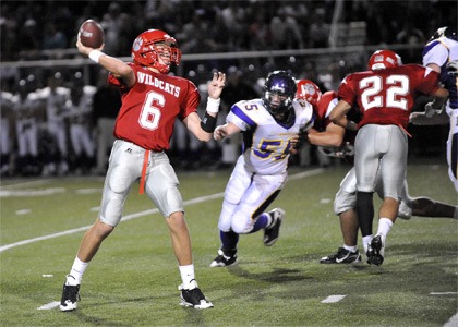 Mount Si quarterback Chris Clark fires a pass during action Friday