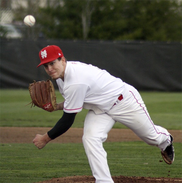 Mount Si pitcher Trevor Lane fires off a pitch in the first inning of the Wildcat-Islander game Wednesday