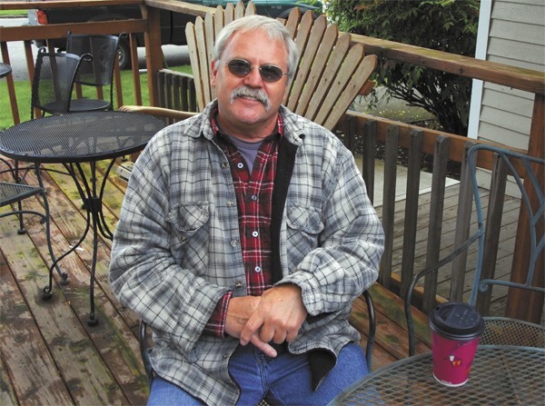 Retired Carnation city employee Bob Gilbertson keeps an eye on the community from his regular coffeeshop table.