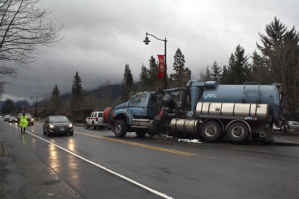 A truck driver got stuck in loose soil Tuesday morning in Snoqualmie while making right onto Railroad Avenue. The road remained restricted while cleanup of spilled diesel fuel was completed.