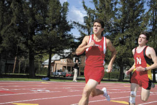 Taking the lead in a key moment of his win in the mile race