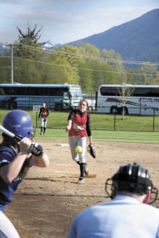 Wildcat pitcher Alex Johnson throws to Jessica Bladow of Seattle Prep during play Thursday