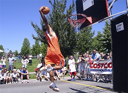 A participant at last year's dunk contest soars for a slam at the Snoqualmie Ridge 3 on 3 tournament. Registration ends Wednesday for this year's event. More teams than ever are taking part.
