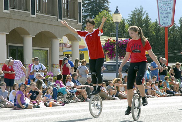 Snoqualmie Valley Unicycle Club members celebrate a successful stunt.