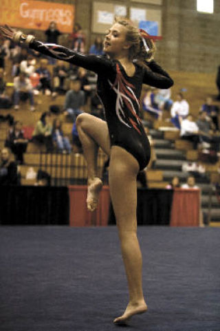Mount Si’s Lexi Swanson performs her routine on the floor during Kingco championship competition last Saturday. The Wildcats made history when they took first in competition.
