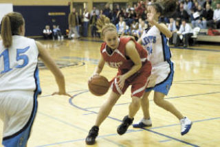 Aubrey Larion goes in for a basket against an Interlake defender in play last week.