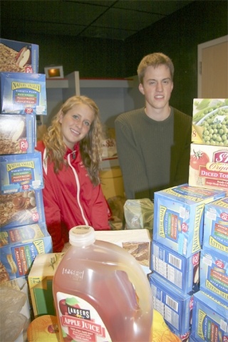 Foodball coordinator Nikki Stanton and ASB President Ben Olson have helped to collect more than eight tons of food so far this year for Valley food banks.