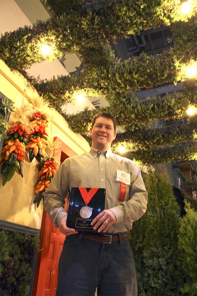 Adam Gorki of North Bend won a silver medal for his company's “Leisurely Morning in Mexico City” display garden at the Northwest Flower and Garden Show in Seattle. The garden show ran Feb. 5-9.