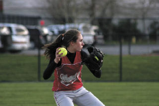 Mount Si’s Maura Murphy gets ready to fire a ball to first during play last Wednesday