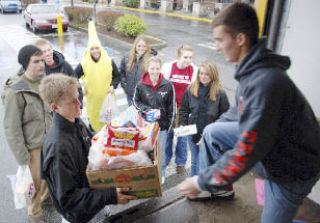 Launching a final push in their Foodball drive Saturday morning