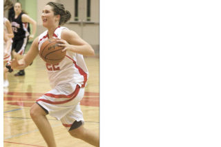 Defenders didn’t have a chance against Mount Si’s Caitie Richards during the Wildcat’s Dec. 12 home match. The ‘Cats and Richards fared less well in last Monday’s visit to the newly opened Cedarcrest court. The Red Wolves held Richards to six points.