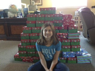 Eleven-year-old Julia Navidi of North Bend personally funded and packed shoebox gifts for Operation Christmas Child. She met an ambitious goal this season.