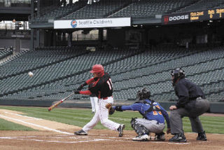 Mount Si’s Rossco Castagno swings at a Cody Hebner pitch in the first inning of Saturday’s game against Auburn Mountainview at Safeco Field. Castagno singled in this at-bat