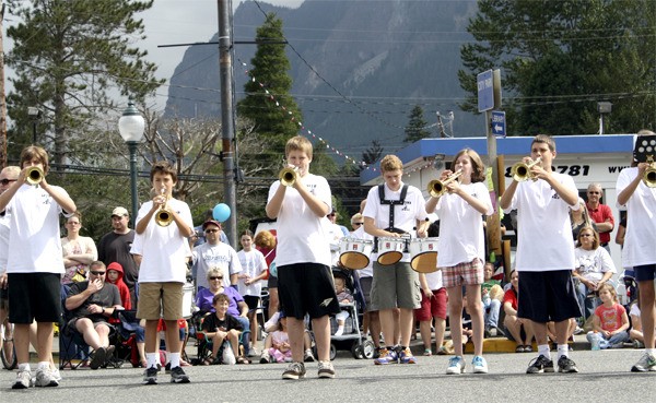 Marching band musicians perform in the 2011 Festival at Mount Si parade