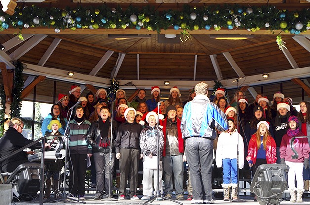 Twin Falls choir members perform during the holidays at the Leavenworth gazebo.