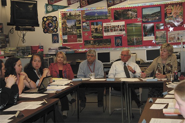 Mount Si High School administrators meet with a dozen concerned students in a private bullying forum Monday