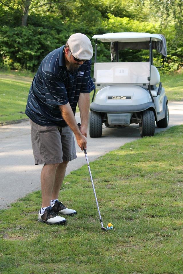 Andrew Glandon of South Fork Geosciences tees off June 28 at the Snoqualmie Valley Chamber of Commerce golf tournament.