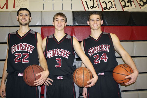 Senior members of the Cedarcrest Red Wolves boys’ basketball team are