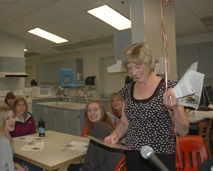 Mount Si High School culinary teacher Laura Tarp reacts to news that she is one of the Snoqualmie Valley Schools Foundation's Educators of the Year. The Valley's top educators will be honored at the foundation's luncheon and main fundraiser