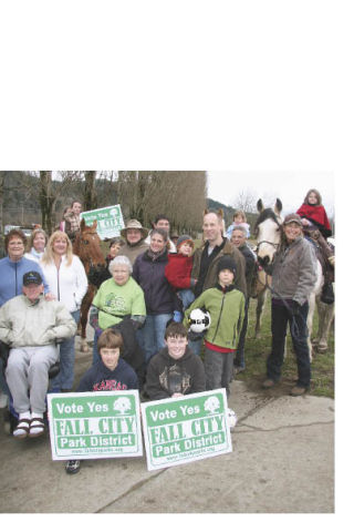 Supporters of a new Fall City Park District promote the cause at Fall City Park. The group seeks to manage park and recreation facilities in Fall City neighborhoods and parts of the Fall City Fire District. A mail-in vote on the creation of the district is set for Feb. 3.