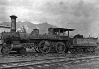 An early Snoqualmie Mill Company steam engine stops in Snoqualmie in 1895. Snoqualmie Mill Company preceded the Snoqualmie Falls Lumber Company
