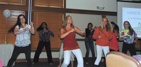 Women in Business members offered a preview of the 'flash mob' dance planned for the North Bend Block Party