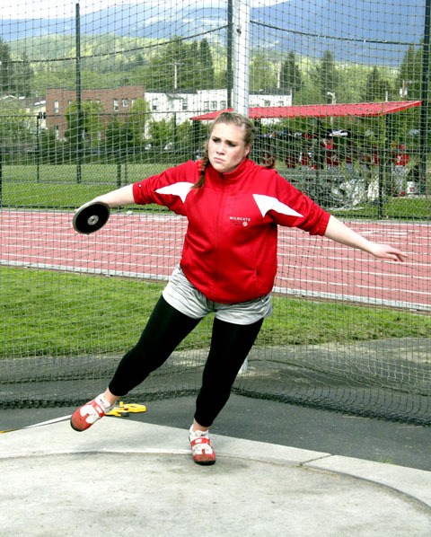 Mount Si thrower Molly Meyers winds up for a throw in the discus at home Thursday