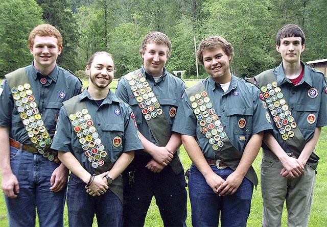 Receving their Eagle awards in Boy Scouts are