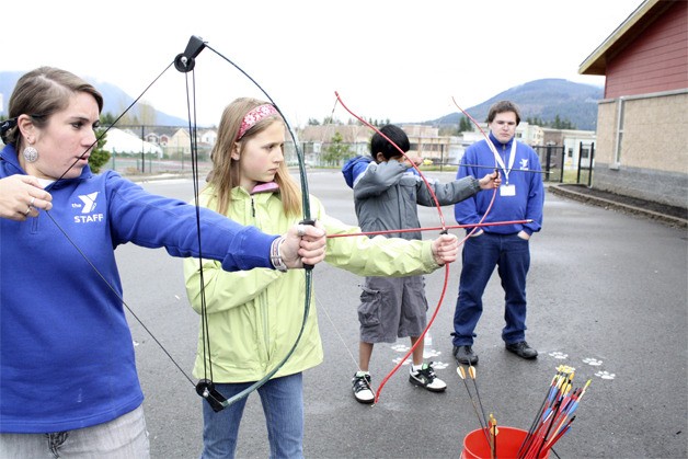 YMCA Staff lead children in archery lessons during the first Healthy Kids Day in Snoqualmie. Healthy Kids Day returns with play