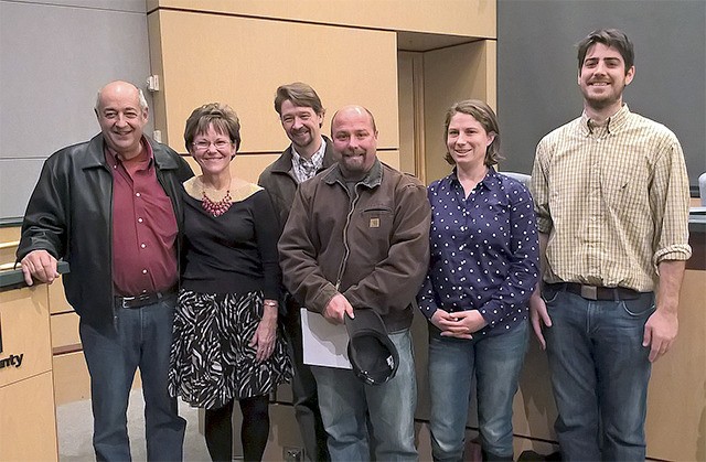 King County Councilwoman Kathy Lambert congratulates the newly elected watershed improvement district commissioners last week. Pictured from left are: Gary Remlinger