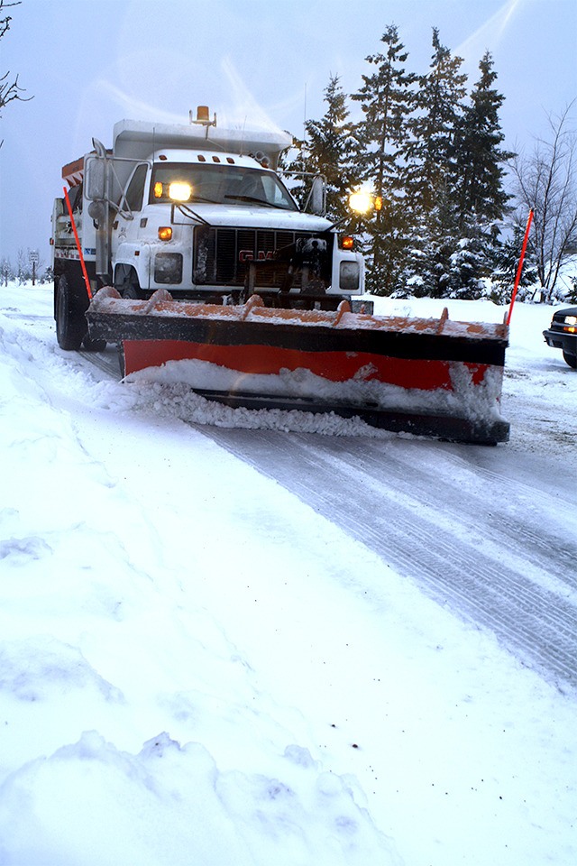 Snowplow driver Todd Shinn makes a pass on Eagle Lake Drive in Snoqualmie