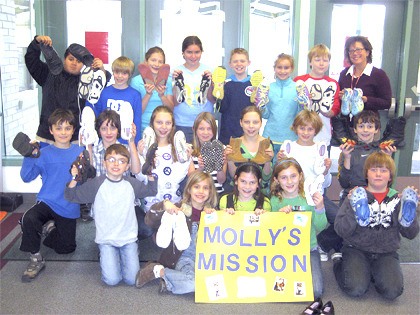 Shari Myers' fourth grade class was inspired to carry on Port Orchard's Molly Hightower's mission to donate shoes to orphans in Haiti. However