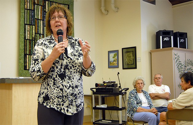 Peggy McNamara talks about leadership at the Sno-Valley Senior Center’s reception July 28. She is the center’s new director.