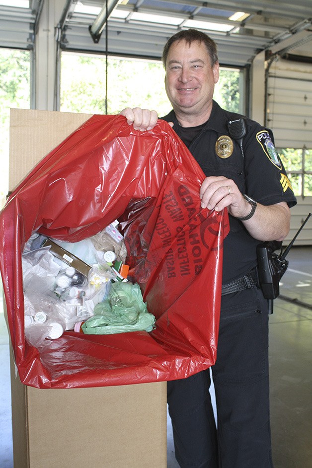 Bob Keeton with one of the boxes he collected during Drug Take Back Day.