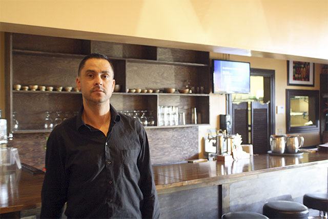 Caadxi Oaxaca owner Francisco Romo poses at the bar of his new restaurant in downtown Snoqualmie. The restaurant serves traditional family favorites from southern Mexico.