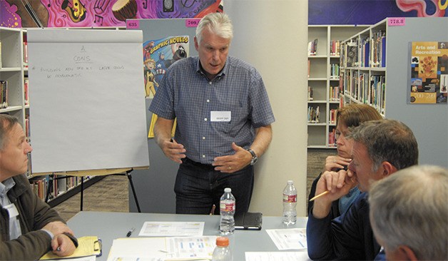 Board director Geoff Doy of North Bend explains an option for Valley school construction at a Tuesday