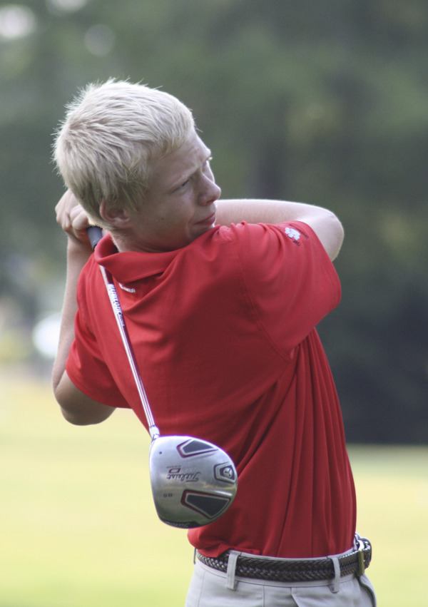 Wildcat freshman Alex Nelson drives on hole 13 of the Mount Si Golf Course on Sept. 17. He co-medaled with Sebastian Gant.