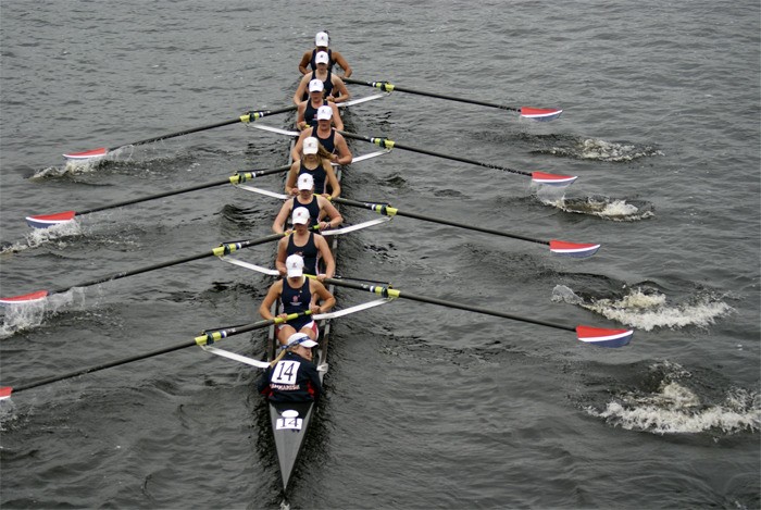 Sammamish Rowing Association’s Women Youth Eight rows on Boston’s Charles River during the Head of the Charles regatta