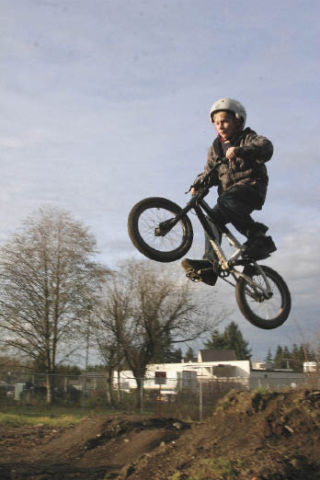 Dayton Hughes of North Bend soars on wheels during a recent ride at the new Torguson bike park. Riders say they’re looking forward to telling friends to ride in North Bend instead of further afield.