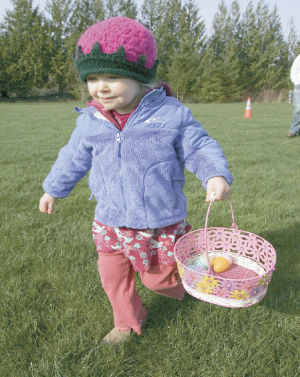 Two-year-old Katie Bero of Snoqualmie searches for that next elusive egg on Saturday morning