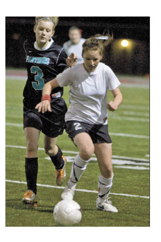 Mount Si’s Brittany Conway works with the ball during Thursday night’s soccer game against Bonney Lake.