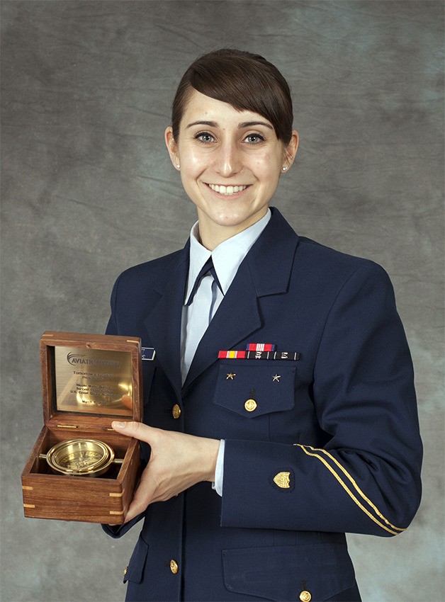 Nicole Garrett with her Aviation Week leadership award.