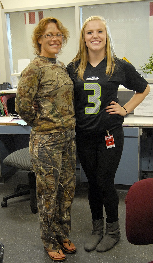 Staff at Mount Si High School got into their own camouflage during Homecoming Week. In full face-paint and camp