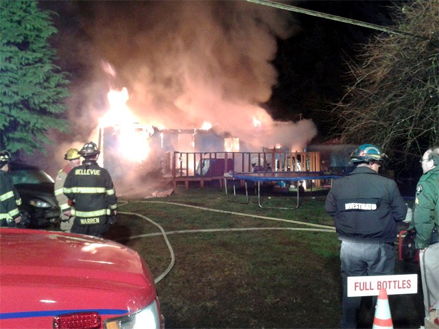 Several departments responded to a fully involved house fire Friday at a residence in North Bend.